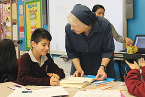 Vision 2016 Tomshack 5 Instruments of God for the sake of the poor Sister Kathleen Powers, D.C. provides student support as an extra teacher in the classroom
